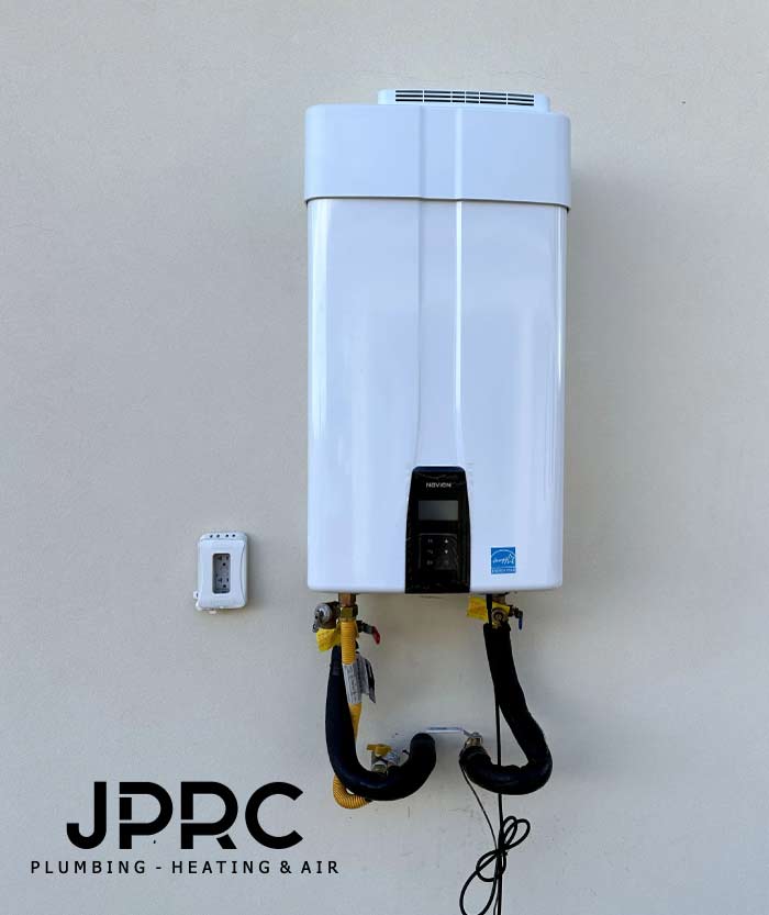 New water heater installation for a home, provided by an experienced plumber in Exeter.