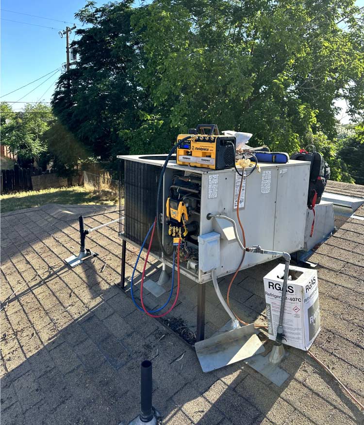 residential AC repair in progress at a retail building in the San Joaquin Valley